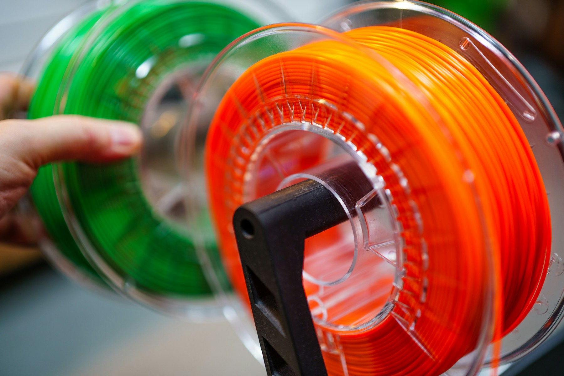 Colorful PLA and PETG filament spools for custom 3D printing