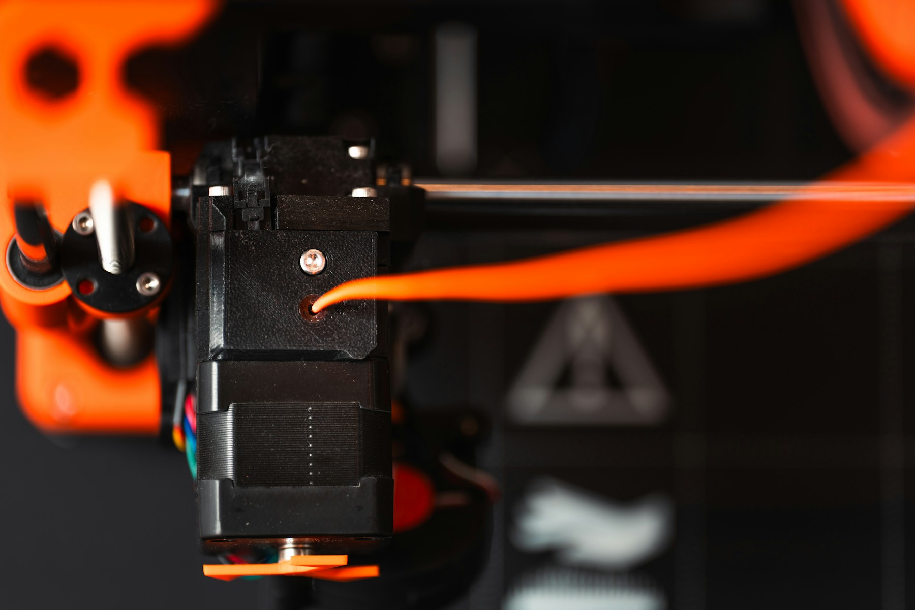 Close-up 3D printer nozzle for bed leveling and first-layer calibration